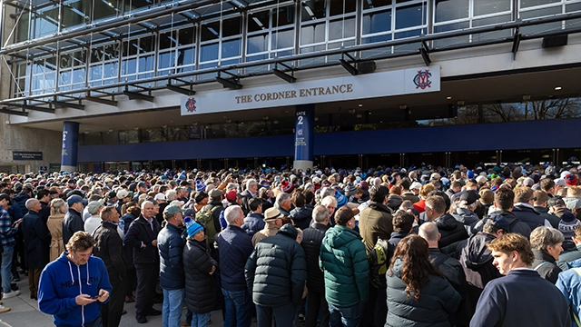 Crowd queues outside Gate 2 of the MCG on AFL Grand Final Day AFLGF25_270925_023_Preview Image Card_640x360.webp