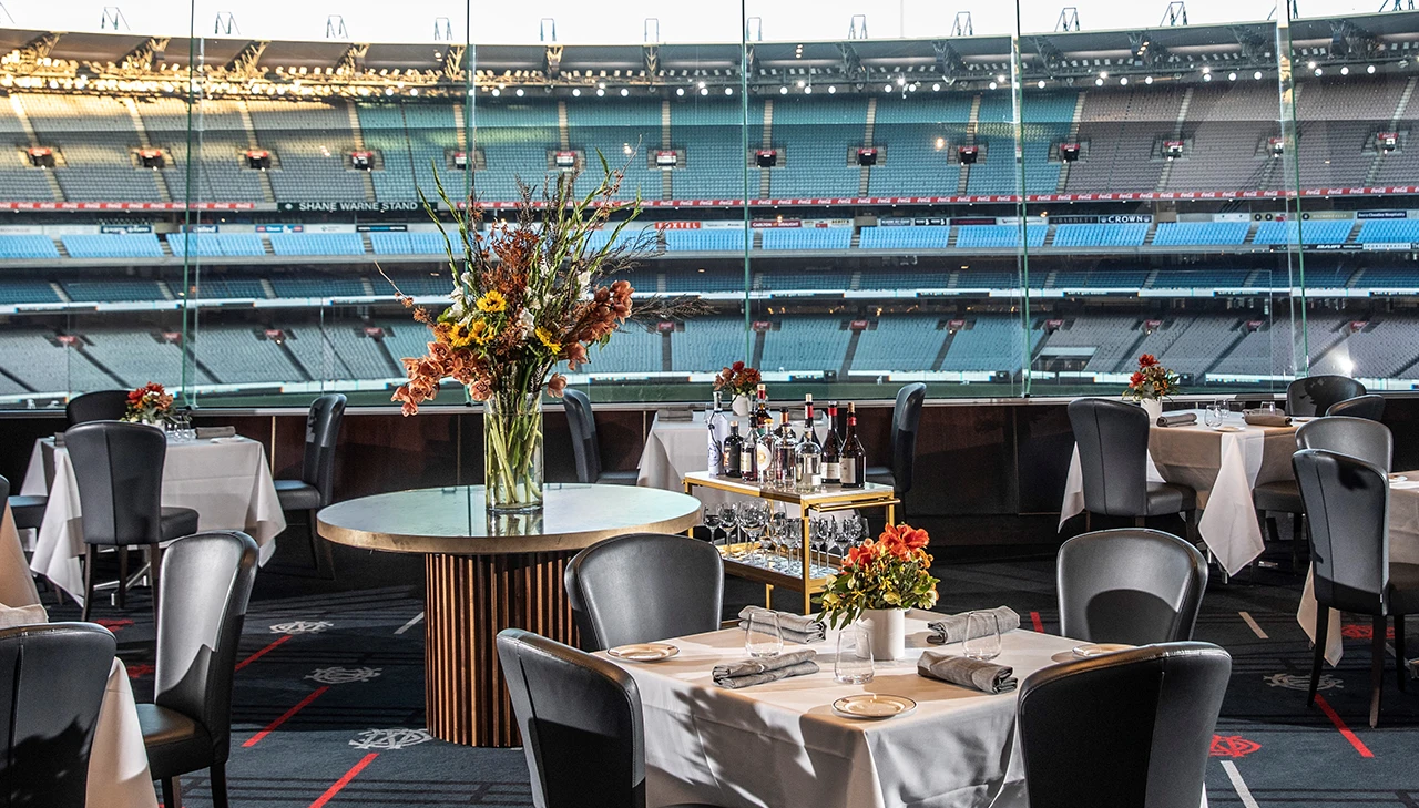 Formal dining space with a view of MCG stands