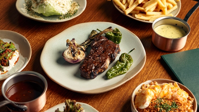 Jim Stynes Grill A spread of food on the table at the Jim Stynes Grill located at the MCG