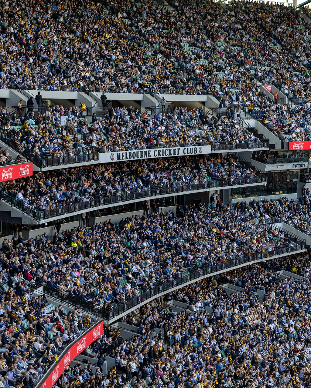 The Melbourne Cricket Club Members' Reserve on a match day at the MCG AFL25RD6_GEELvHAW_288_Text and Image desktop_1024x1280.webp