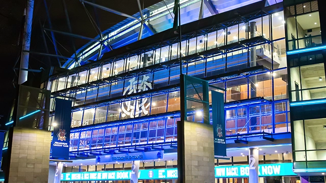 Gate 2 of the MCG lit up in blue at night Gate 2 of the MCG lit up in blue at night