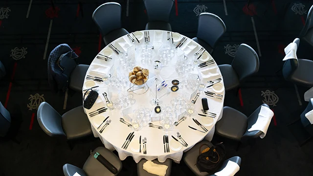 Formal dining arrangement set for 10 guests